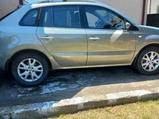 KOLEOS  -  118500 Km.  -  Carte service si istoric RAR la zi